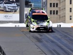 Ken Block's Ford Fiesta barely clears the ramp - Anne Proffit photo