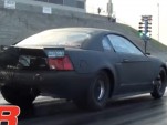 Kevin Fiscus runs 4.33 seconds at 180 mph in the 1/8th mile on drag radials