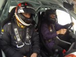 Kimi Raikkonen instructs Natalie Pinkham on ice driving technique