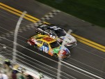 Kyle Busch leads Tony Stewart to the checkers - NASCAR photo