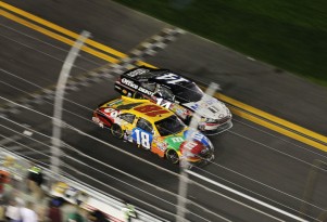 Kyle Busch leads Tony Stewart to the checkers - NASCAR photo