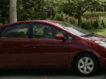 Kyle with his family Toyota Prius  