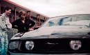 Latifah and Braun with the 2010 Mustang