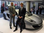 Lewis Hamilton and Jenson Button at the McLaren dealership in London