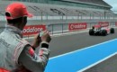 Lewis Hamilton pilots the McLaren F1 remote control car