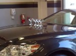 Lexus uses a 2011 LS 460 in its latest champagne glass ad