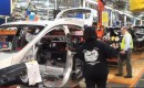 Lithium-ion battery pack installation in 2012 Ford Focus Electric at Wayne Assembly Plant