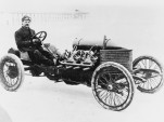 Louis Chevrolet behind the wheel of a Darracq racer, 1906. Image: GM Corp.