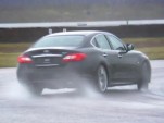 Mark Webber slides an M37 around Rockingham