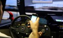 Mazdaspeed Motorsports driver Connor De Phillippi stacks a virtual race car while texting