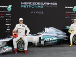 Michael Schumacher and Nico Rosberg with the 2012 Mercedes AMG Petronas W03