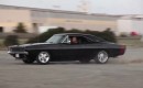 Mike Musto warms the tires on Mr. Angry, his 1968 Dodge Charger