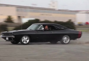 Mike Musto warms the tires on Mr. Angry, his 1968 Dodge Charger