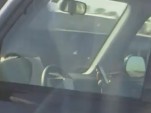 Multitasking man on highway