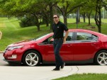 NASCAR racer Jimmie Johnson checks out the Chevrolet Volt