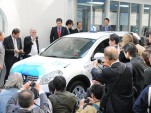 Nissan electric taxi leaving Better Place battery switching station, Tokyo, April 2010