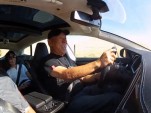 Nobuhiro 'Monster' Tajima, behind the wheel of the Tesla Model S