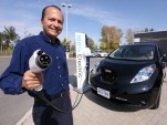 Ottawa resident Ricardo Borba takes delivery of the first consumer Nissan LEAF in Canada