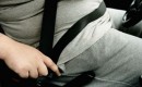 Overweight driver buckling seatbelt