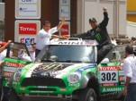 Peterhansel celebrating his 10th Dakar Rally victory