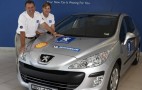 Peugeot 308 HDi breaks two Guinness world records
