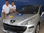 Peugeot 308 HDi breaks two Guinness world records