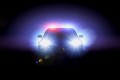 Police car with headlights on