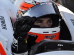Power debriefs in the pits - Anne Proffit photo