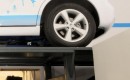 Prototype of adapted vehicle hoist to permit NuTankX gasoline-tank swapping