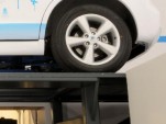 Prototype of adapted vehicle hoist to permit NuTankX gasoline-tank swapping