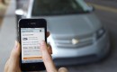 Relay Rides smartphone app for car sharing, with 2012 Chevrolet Volt in background