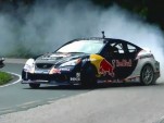 Rhys Millen drifting up a Brazilian Mountain in his Red Bull/RMR Genesis Coupe
