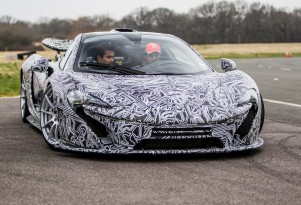 Sergio Perez drives the McLaren P1 at Dunsfold Aerodrome - image: McLaren