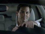 Smug Infiniti M Hybrid driver