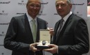 TAG Heuer's Jean-Christophe Babin poses with McLaren's Ron Dennis