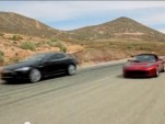Tesla all-electric Model S sedan and Roadster sports car shown together on video