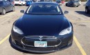 Tesla Model S with DISRUPT license plate, March 2013 [photo: Sam Villella]