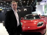 Tesla Motors CEO Elon Musk with Tesla Roadster