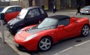 Tesla Roadster, Reva i, & Ford Th!nk electric cars parked at charging station in Oslo, Norway