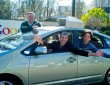 The founders of Google and one of their autonomous Toyota Prius hybrids