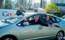 The founders of Google and one of their autonomous Toyota Prius hybrids