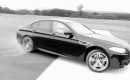 The Stig drives the 2012 BMW M5...in circles