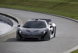 The upcoming McLaren P1 makes a cameo at the MP4-28 reveal