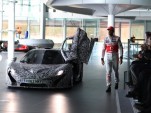 The upcoming McLaren P1 makes a cameo at the MP4-28 reveal