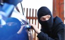Thief Stealing a Car