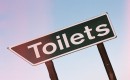 Toilets sign by flickr user Koffiemetkoek