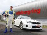 Tommi Makinen with a Subaru WRX STI