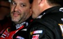 Tony Stewart confers with teammate Ryan Newman - NASCAR photo
