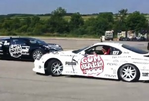 Toyota Supra drifts around Bugatti Veyron at Gumball 3000