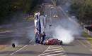 Toyota TS030 hybrid Le Mans prototype flying through the air at 24 Hours of Le Mans